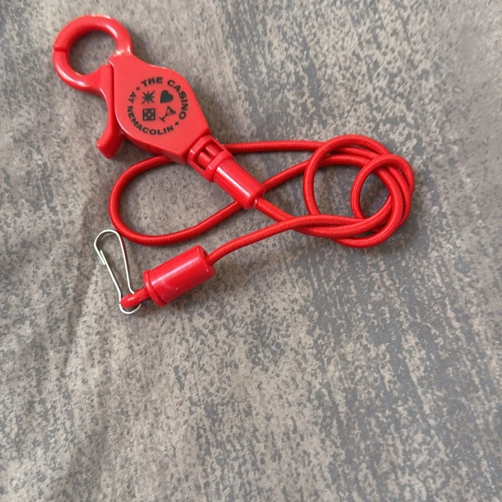 The Casino At Nemacolin lucky player’s card cord. Never used. Red.